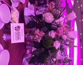 The luncheon bouquets and centerpieces featured beautiful American grown roses, peonies, stock, tulips, lilies, protea, Bells of Ireland, alstromeria, bupleurum, dianthus, freesia, lisianthus, ranunculus, viburnum, waxflower, ferns, leatherleaf and curly willow.