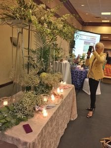 Cyleste Mackey of Fassler Florist Floral & Event Designers in Fort Wright, Kentucky, gets inspiration from designs by Jerome Raska, AAF, AIFD, PFCI, CAFA, of Blumz by…JRDesigns in metro Detroit, for his presentation at the 1-Day Profit Blast in Cincinnati this spring. 