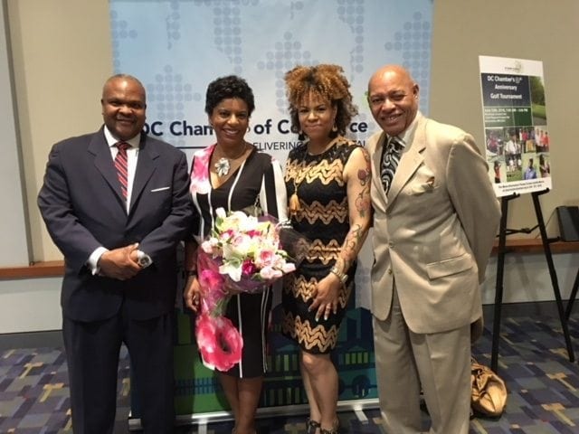 A segment for “Good Morning Washington” focused on Lee’s Flower & Card Shop—the business’ approach to Mother’s Day and also its ties to the community and a recent award presented to co-owner Staci Lee Banks, second from left, who was named Small Businessperson of the Year by the D.C. Chamber of Commerce. Pictured with Lee: Her husband, Jeffrey Banks; sister and business partner Kristie Lee; and father Rick Lee.