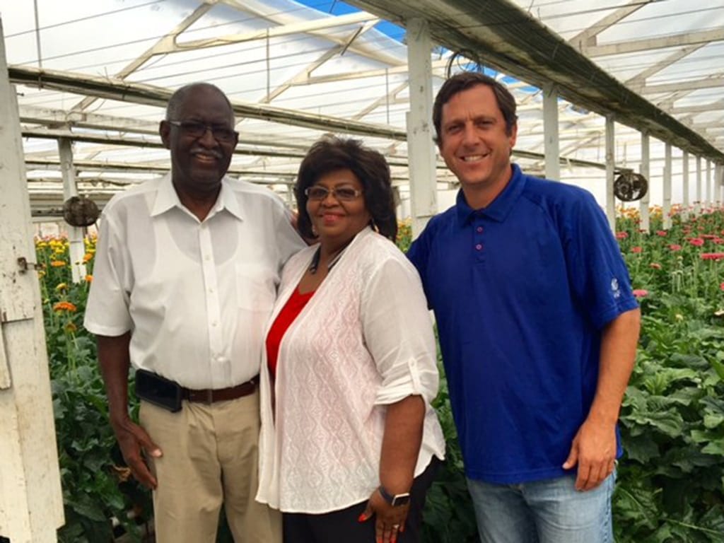 Pat and Allen Houck of House of Blooms in Sugar Land, Texas, with Mike Mooney of Dramm & Echter in Encinitas, California. The retailers toured the grower’s operation after making a connection at SAF Palm Springs 2018.